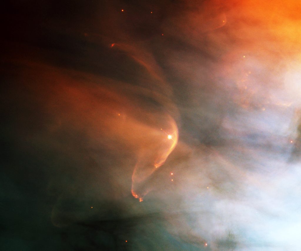 The solar wind causing a bow shock around the star L.L. Orionis